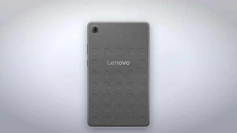 Back of the Lenovo Tab One in speckled Luna Grey plastic with a circle pattern, the Lenovo logo and the single rear camera in the corner