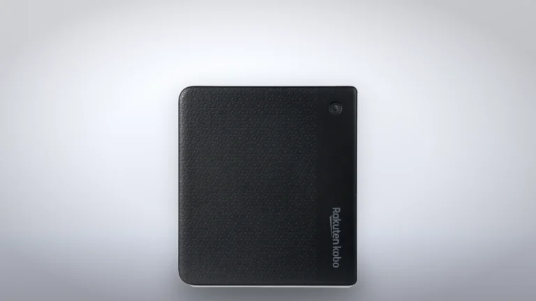 Back of the black Kobo Libra Colour with its textured cover, round power button and Rakuten Kobo logo
