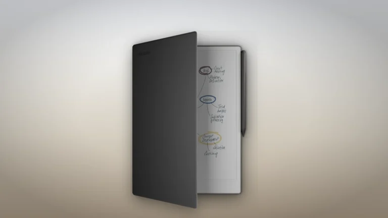 reMarkable Paper Pro standing in an open grey Book Folio with the Marker clipped to its edge