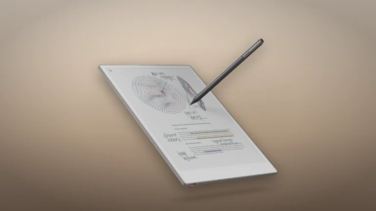 reMarkable Paper Pro at an angle with the Marker above an annotated page of sketches and highlighted typed text