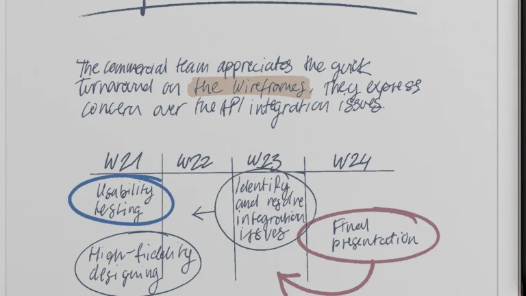 Close view of handwritten notes on the reMarkable Paper Pro screen with blue and red circled items and a light brown highlight